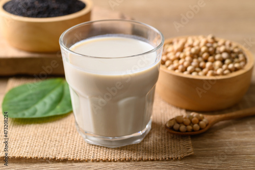 Soy milk with black sesame on wooden background, Healthy drink