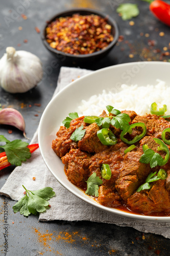 Traditional Beef curry with rice and Spicy