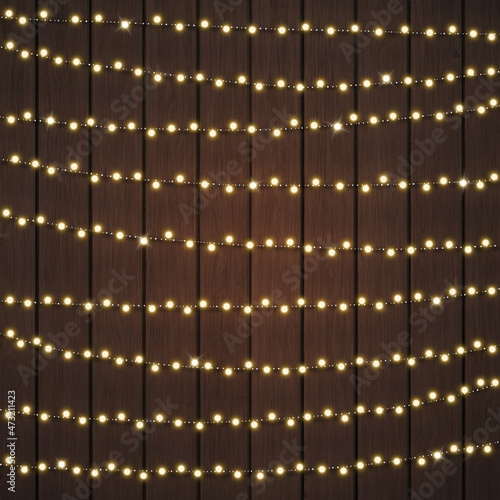 Beautiful Warm White String Lights and Bokeh on Dark Brown Wood