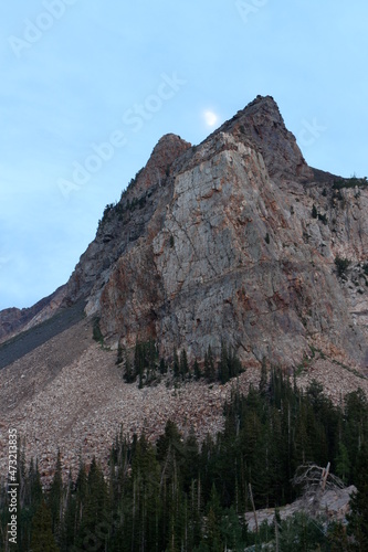 sundial peak and moon in the Wasatch mountains of utah