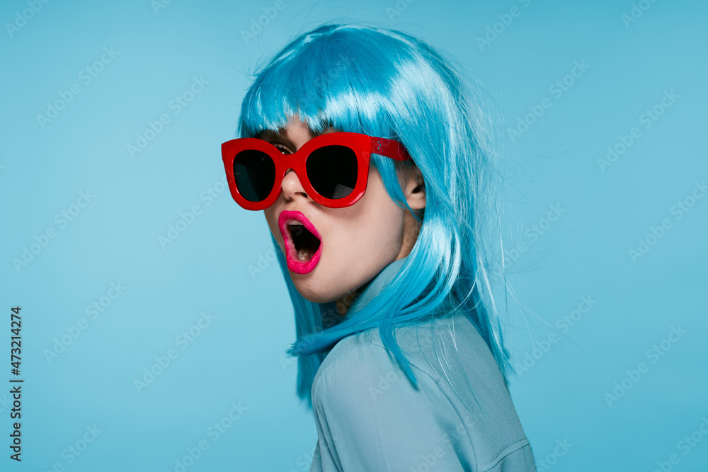 attractive woman in purple wig red glasses posing close-up attractive woman in purple wig red glasses posing close-up