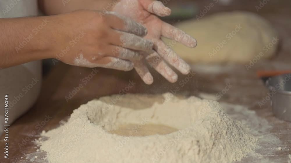 man's hands working with wheat flour man's hands working with wheat flour