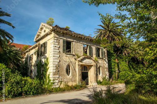 Abandoned former hotel near Dubrovnik, left during Jugoslavian war 1991 photo