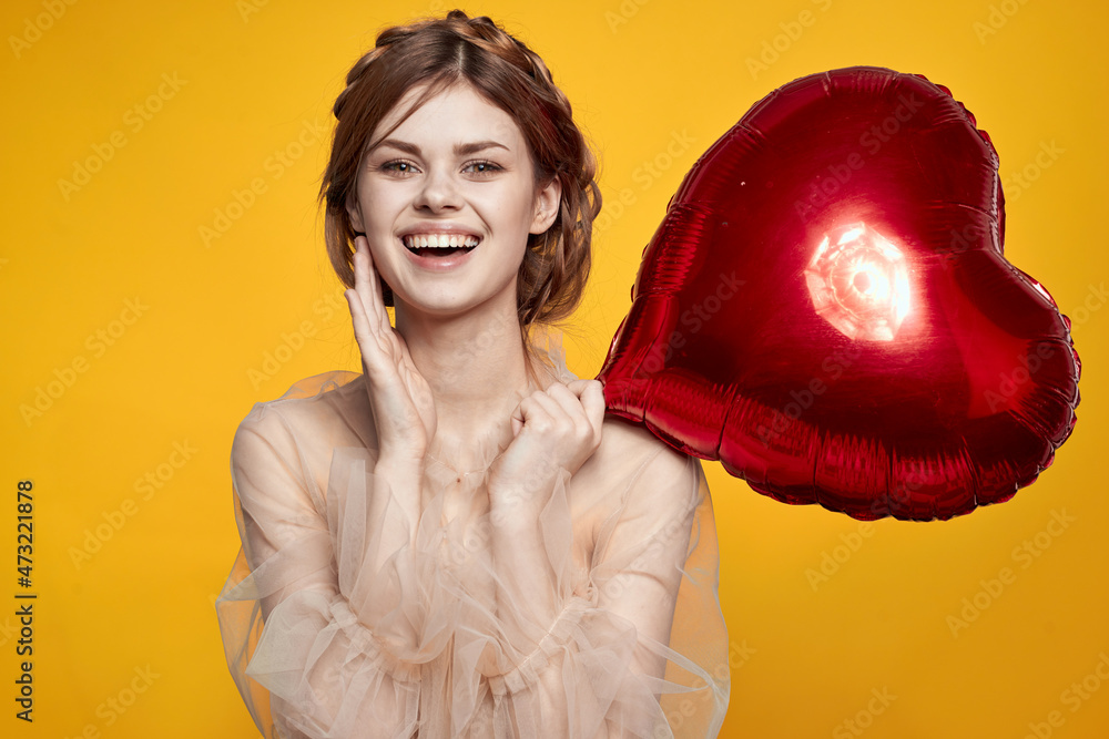 portrait of a woman red heart in the hands of the balloon isolated background portrait of a woman red heart in the hands of the balloon isolated background