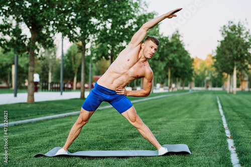 male athlete muscle exercise workout in the park