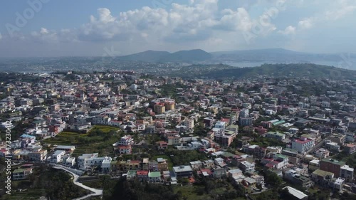 A small town on the hill filmed from the sky using a drone photo