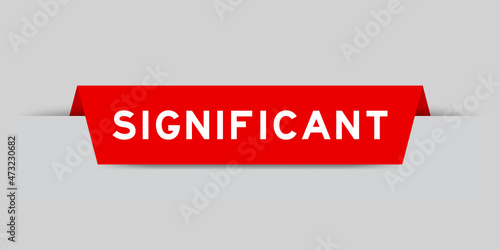 Red color inserted label with word significant on gray background