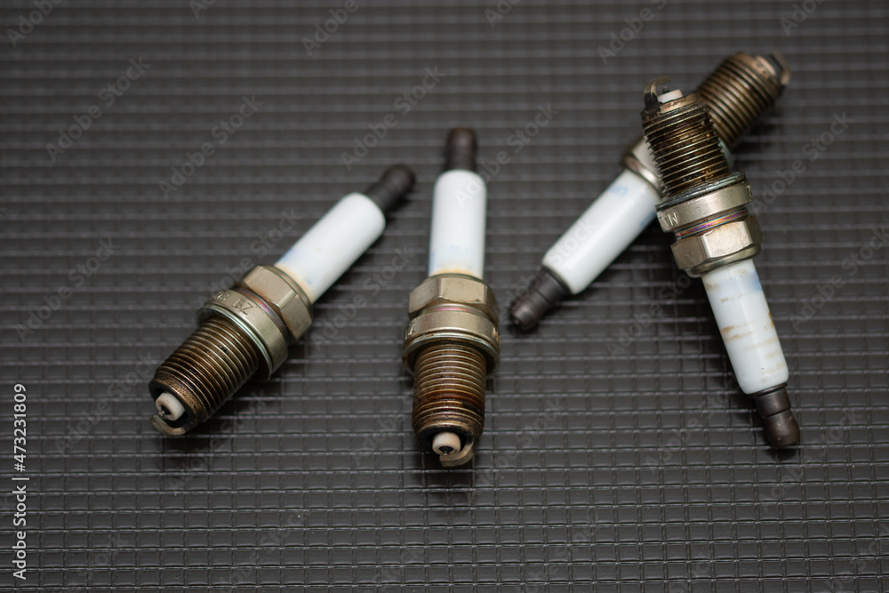 old car spark plug isolated old car spark plug isolated