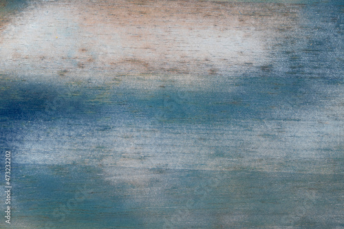 Blue and white textured wooden plank background.