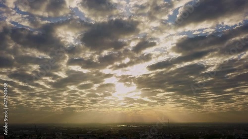 Time lapse of Moving Cloud in sunset sky with aerial view photo