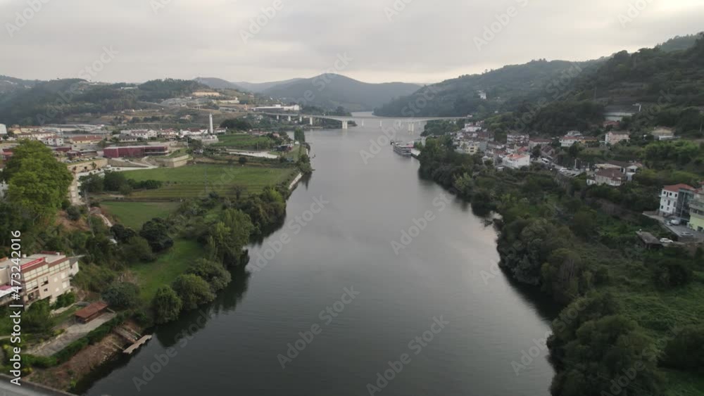Tãmega and Douro River against mountains and sky, Entre-os-Rios, Portugal Tãmega and Douro River against mountains and sky, Entre-os-Rios, Portugal