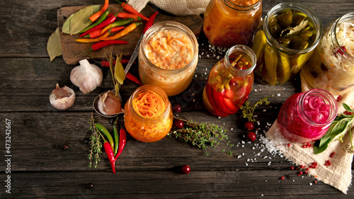 Fotografie Fermented food on wooden table