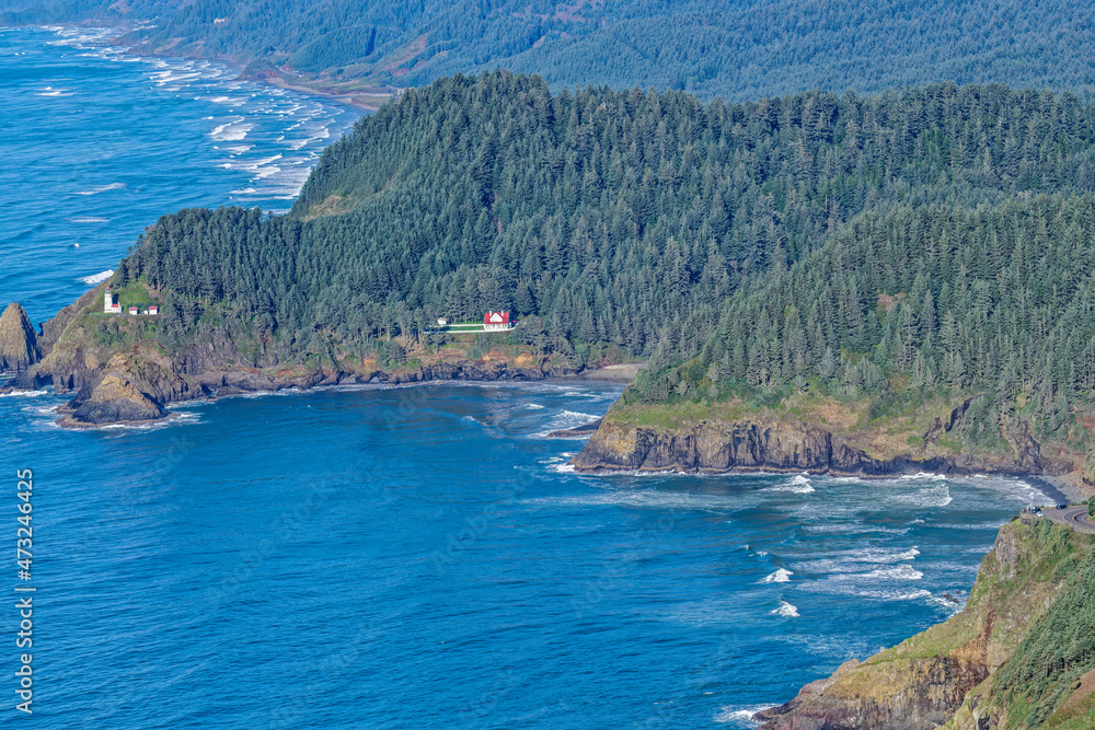 Aerial view of the Heceta Head Lighthouse and Cape Cove on the Oregon coast, USA