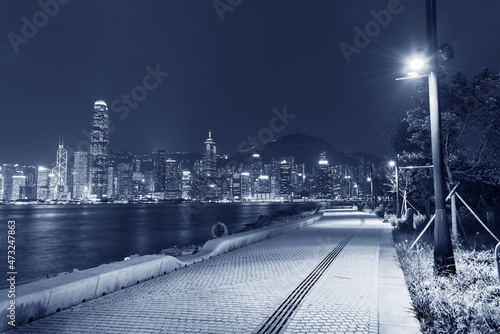 Photography Seaside promenade and skyline of Hong Kong city at night
