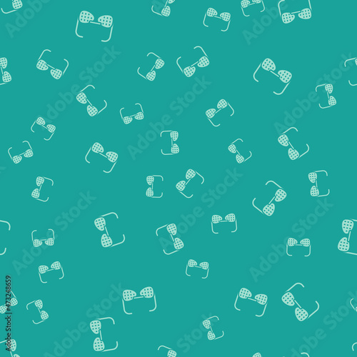 Green Glasses for the blind and visually impaired icon isolated seamless pattern on green background. Vector