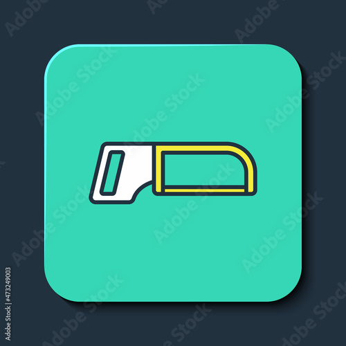 Filled outline Hacksaw icon isolated on blue background. Metal saw for wood and metal. Turquoise square button. Vector