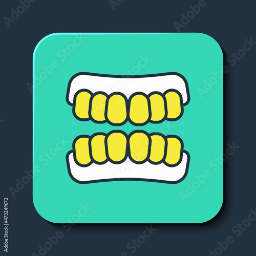 Filled outline Dentures model icon isolated on blue background. Teeth of the upper jaw. Dental concept. Turquoise square button. Vector
