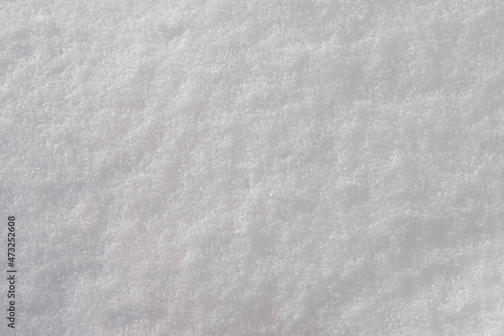 The texture of the snow surface. Winter natural background