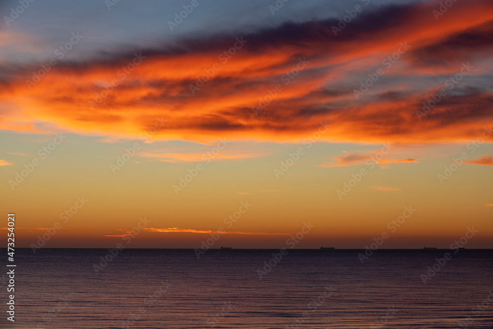 a beautiful landscape before sunrise on the sea