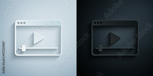 Paper cut Online play video icon isolated on grey and black background. Film strip with play sign. Paper art style. Vector
