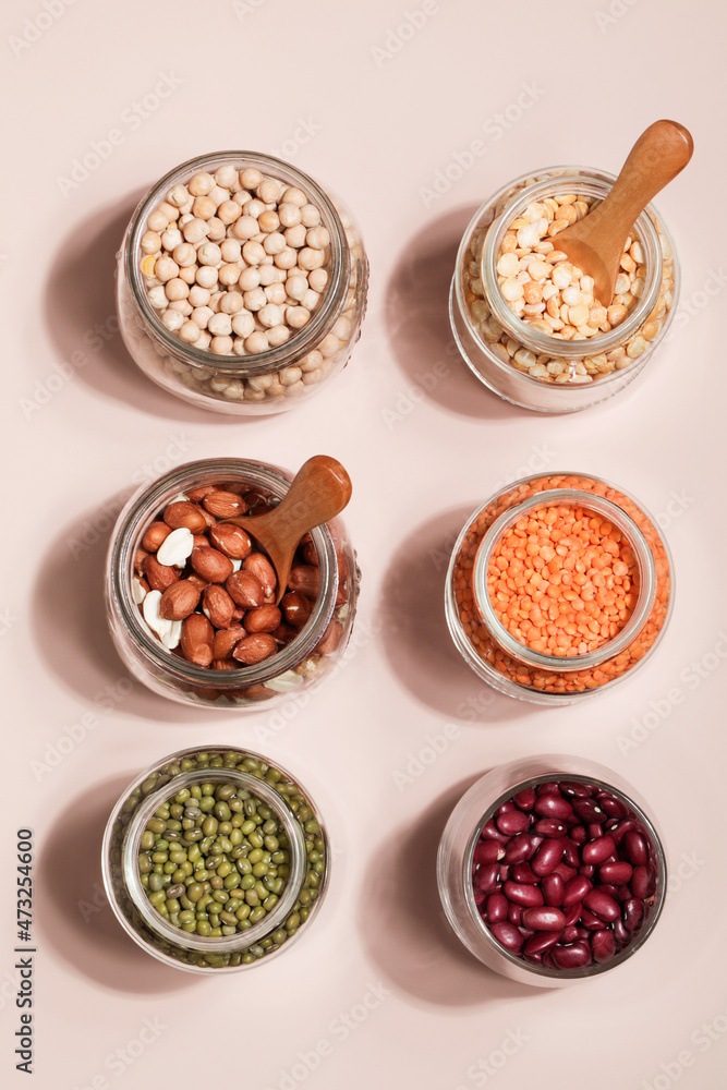 Vegan protein source. Beans, peas, chickpeas, lentils, mung bean, peanut in bowl on beige background. Healthy vegetarian food. copy space Vegan protein source. Beans, peas, chickpeas, lentils, mung bean, peanut in bowl on beige background. Healthy vegetarian food. copy space