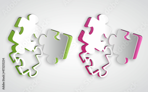 Paper cut Puzzle pieces toy icon isolated on grey background. Paper art style. Vector