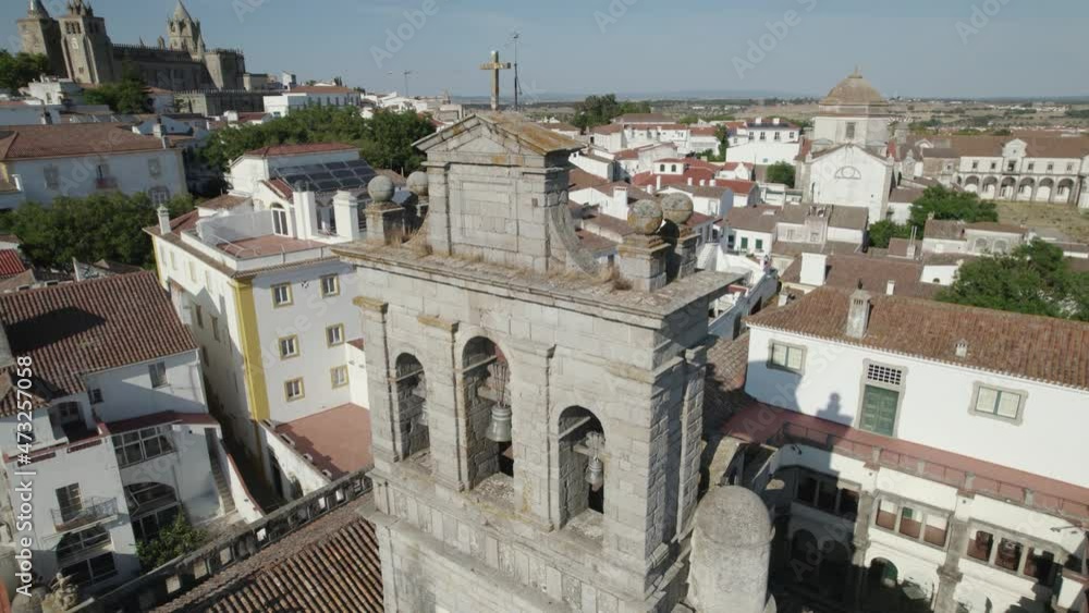 Aerial orbiting around Our Lady of Grace or Igreja da Graca church bell tower of Evora in Portugal Aerial orbiting around Our Lady of Grace or Igreja da Graca church bell tower of Evora in Portugal