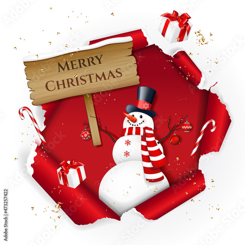 Christmas and New Year greeting card with hole in paper and snowman with wood board.