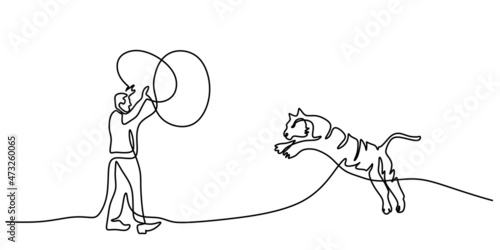 Continuous one single line of man playing with big tiger isolated on white background.
