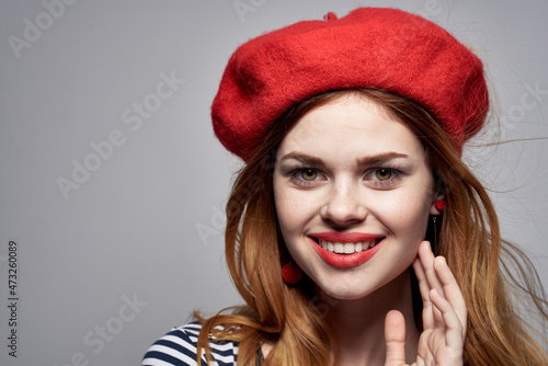 beautiful woman wearing a red hat makeup France Europe fashion posing Fresh air