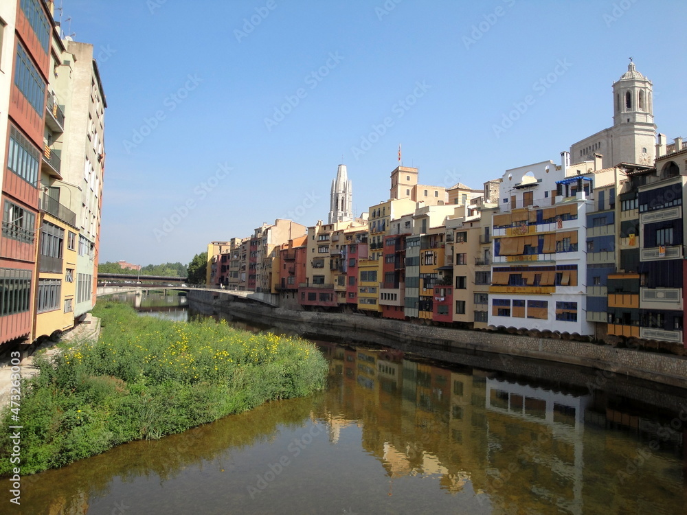 Multicolored houses on the river bank