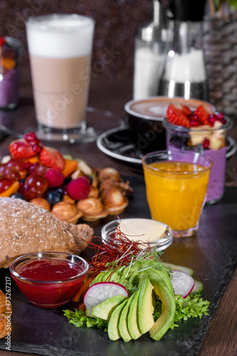 Breakfast or brunch set for two person on rustic wooden table
