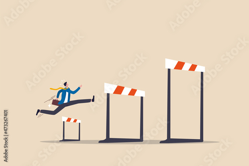 Business challenge, overcome difficulty or obstacle to achieve business success, effort, skill or aspiration to solve problem concept, ambitious businessman jump over hurdles to find higher obstacles. photo