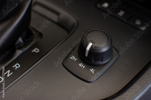 Two-wheel and four-wheel drive system adjustment knobs for off-road. Technology for driving comfort