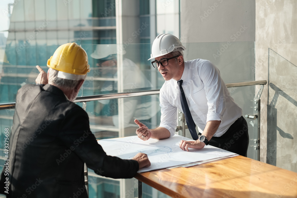 professional old architect and Senior foreman are talking the project professional old architect and Senior foreman are talking the project