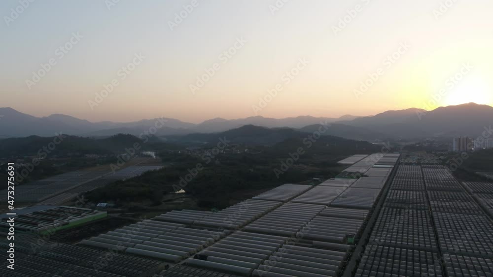 Vegetable shed with mountain village during sunset Vegetable shed with mountain village during sunset