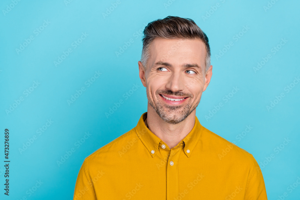 Portrait of attractive cheerful cunning minded man thinking copy space isolated over bright blue color background Portrait of attractive cheerful cunning minded man thinking copy space isolated over bright blue color background