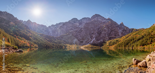 Fototapeta Naklejka Na Ścianę i Meble -  Tatra National Park, Poland. Panorama of mountains lake Morskie Oko Or Eye of the Sea In autumn. Beautiful Tatras Landscape.