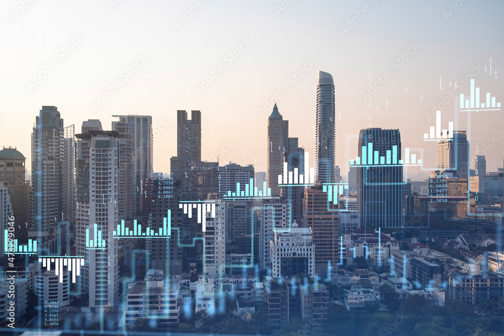 Market behavior graph hologram, sunset panoramic city view of Bangkok, popular location to achieve financial degree in Southeast Asia. The concept of financial data analysis. Double exposure.