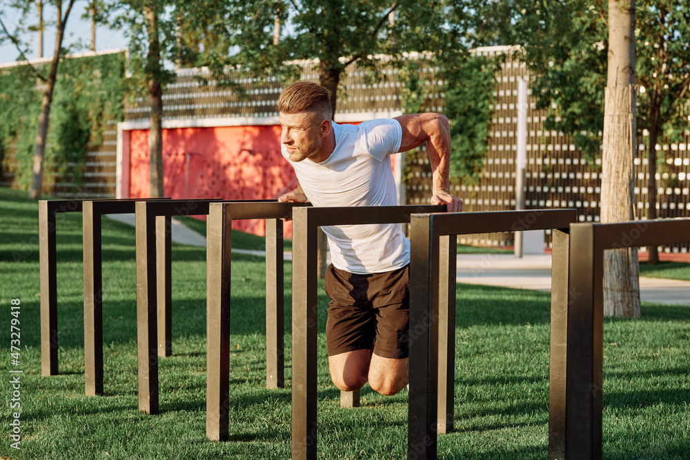 sportive man workout in the park morning motivation sportive man workout in the park morning motivation