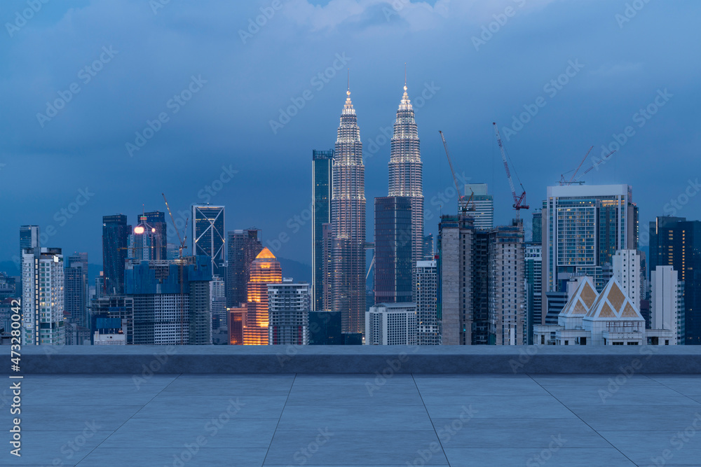 Panoramic Kuala Lumpur skyline view, concrete observatory deck on rooftop, night. Asian corporate and residential lifestyle. Financial city downtown, real estate. Product display mockup empty roof