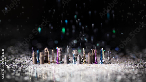 Creative photography of dental titanium implants in snow