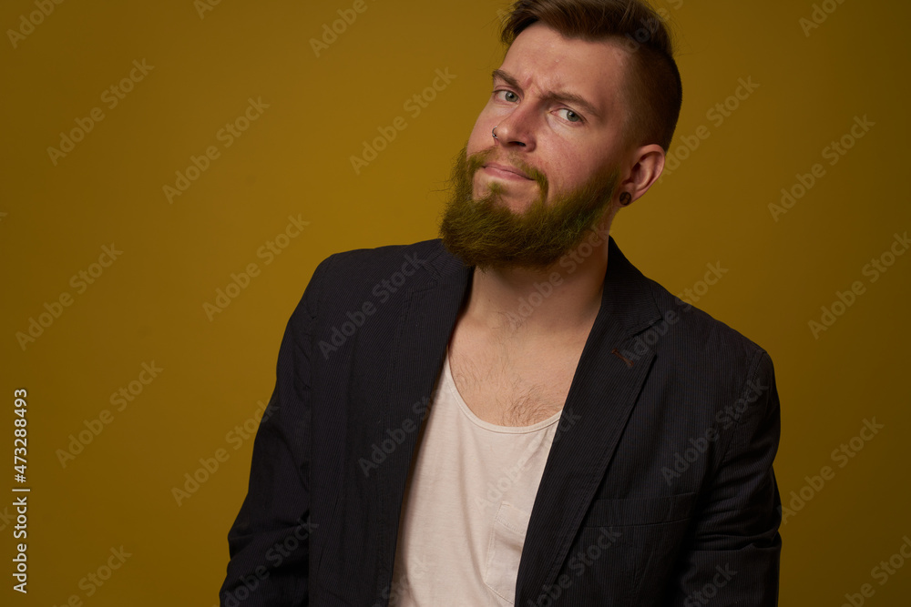 bearded man fashionable hairstyle jacket posing self confidence