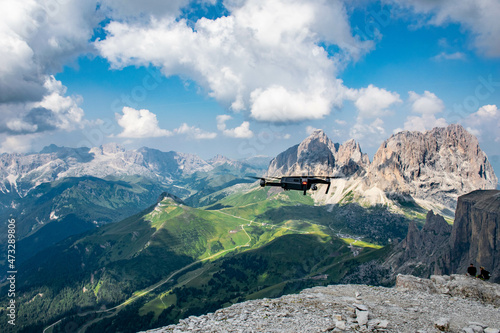 Dolomites, August, 2017, mountain, quadcopter on top of Passo Fedaia, view of the green valley and mountains in the distance