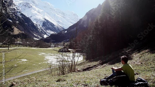 Sipping water from trek exhaustion Switzerland Lauterbrunnen alps photo