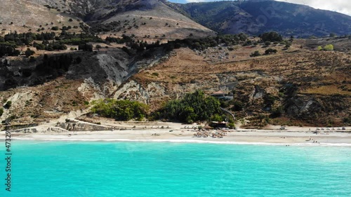 Pristine Blue Water And Rugged Terrain Of Agia Kiriaki Beach In Kefalonia, Greece. aerial photo