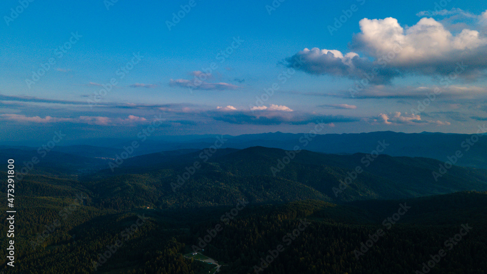 Mountains forest at sunset top view