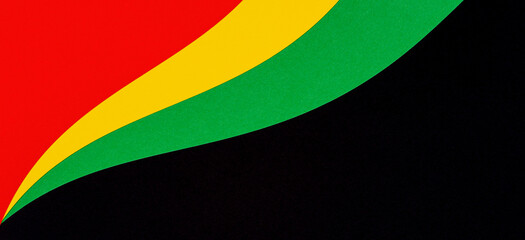 Abstract geometric black, red, yellow, green color background. Black History Month color background with copy space for text
