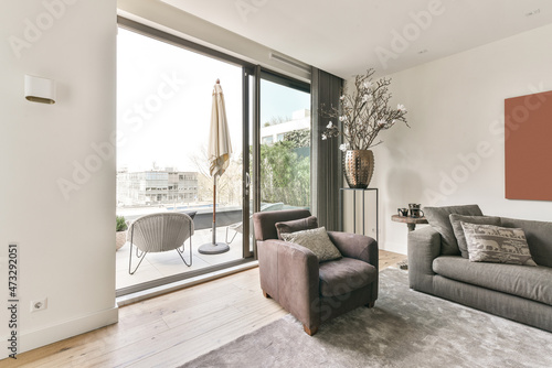 Interior of living room with balcony in modern flat photo