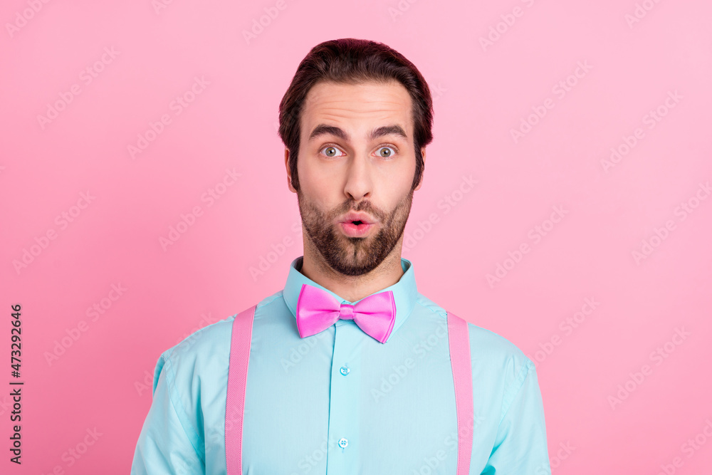 Photo of pretty shocked young guy dressed teal clothes big eyes isolated pink color background Photo of pretty shocked young guy dressed teal clothes big eyes isolated pink color background